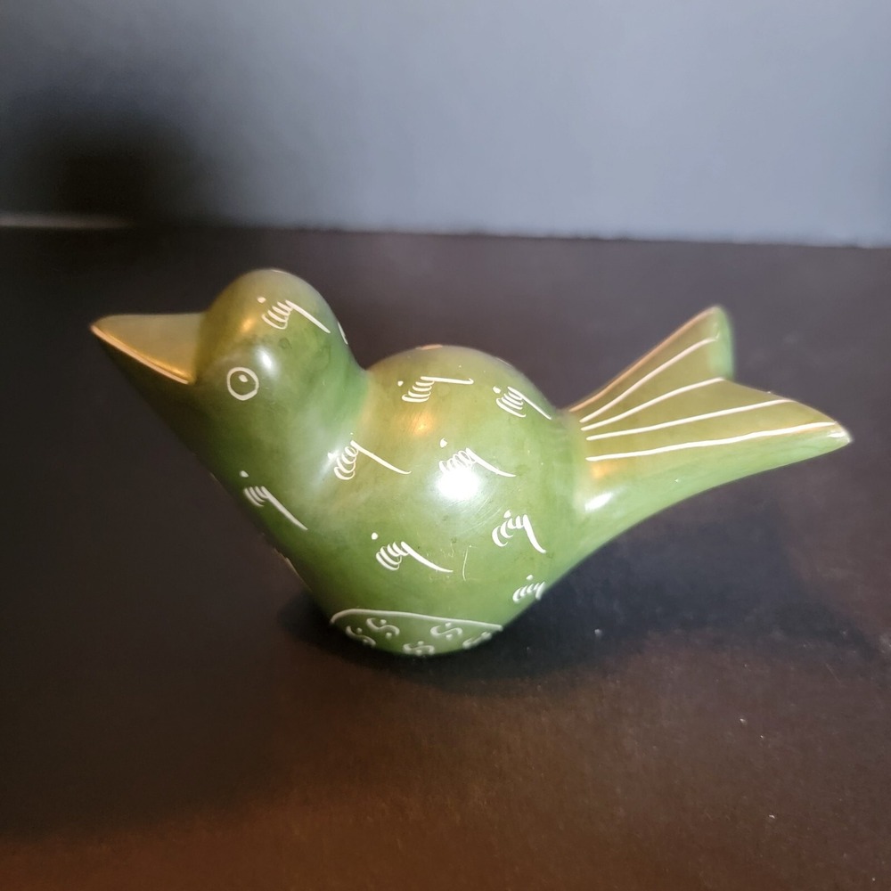 Green Craved Bird Made Of Stone